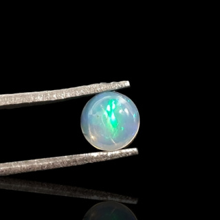 Opal from Ethiopia cabochon fi 6 mm no 825