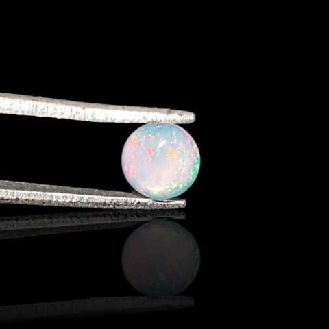 Opal from Ethiopia cabochon fi 6 mm no. 826 Opal from Ethiopia cabochon fi 6 mm no. 826