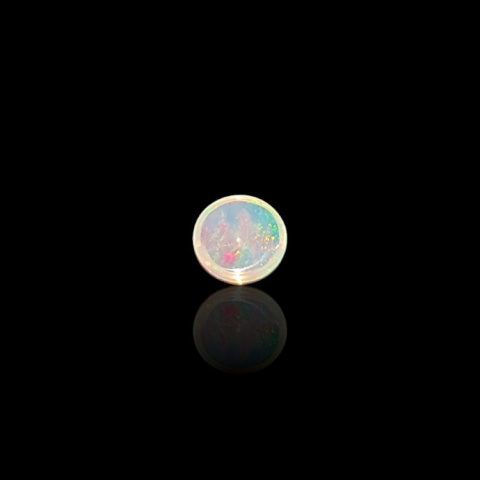 Opal from Ethiopia cabochon fi 6 mm no. 826 Opal from Ethiopia cabochon fi 6 mm no. 826