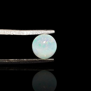 Opal from Ethiopia cabochon fi 6 mm no 829