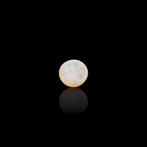 Opal from Ethiopia cabochon dia. 6 mm no 829 Opal from Ethiopia cabochon dia. 6 mm no 829