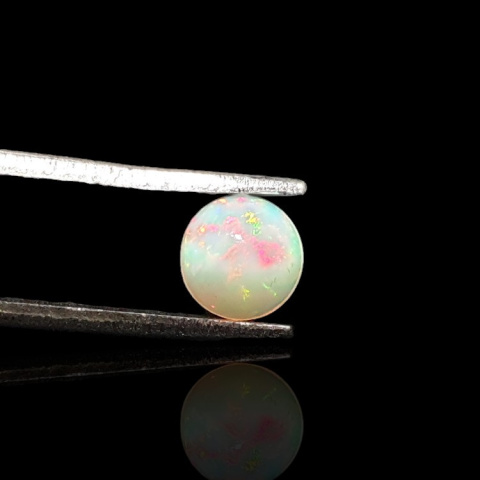 Opal from Ethiopia cabochon fi 6 mm no. 831 Opal from Ethiopia cabochon fi 6 mm no. 831