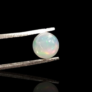 Opal from Ethiopia cabochon fi 6 mm no 832