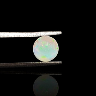 Opal from Ethiopia cabochon fi 6 mm no. 835