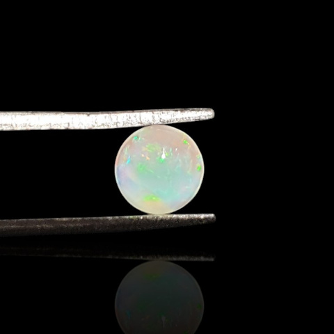 Opal from Ethiopia cabochon fi 6 mm no 835 Opal from Ethiopia cabochon fi 6 mm no 835