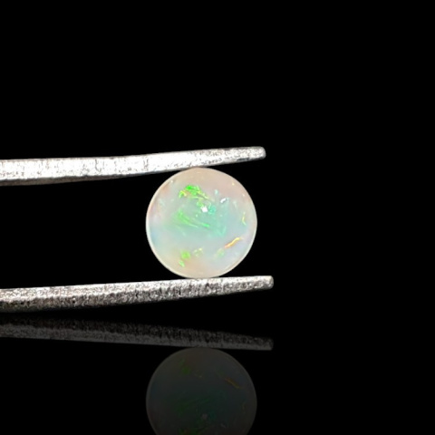 Opal from Ethiopia cabochon fi 6 mm no 835 Opal from Ethiopia cabochon fi 6 mm no 835