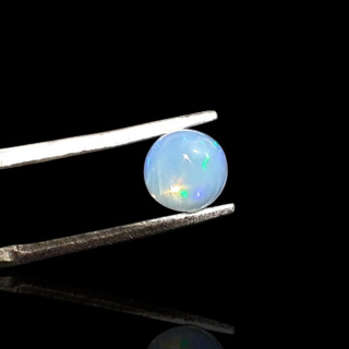 Opal from Ethiopia cabochon fi 6 mm no 836