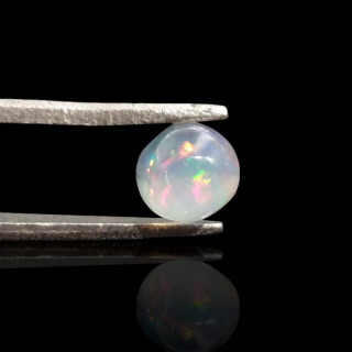 Opal from Ethiopia cabochon fi 6 mm no 837
