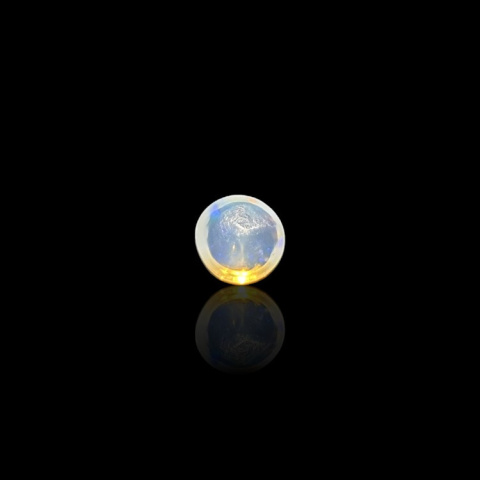 Opal from Ethiopia cabochon fi 7 mm no 797 Opal from Ethiopia cabochon fi 7 mm no 797