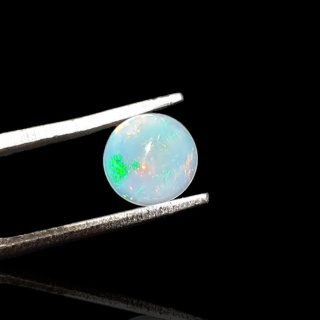 Opal from Ethiopia cabochon fi 7 mm no 798
