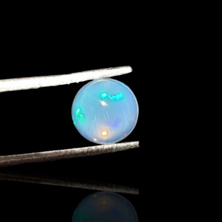 Opal from Ethiopia cabochon fi 7 mm no 799