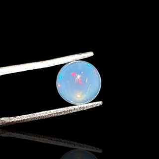 Opal from Ethiopia cabochon fi 7 mm no 799