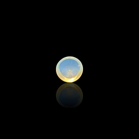 Opal from Ethiopia cabochon fi 7 mm no 799 Opal from Ethiopia cabochon fi 7 mm no 799