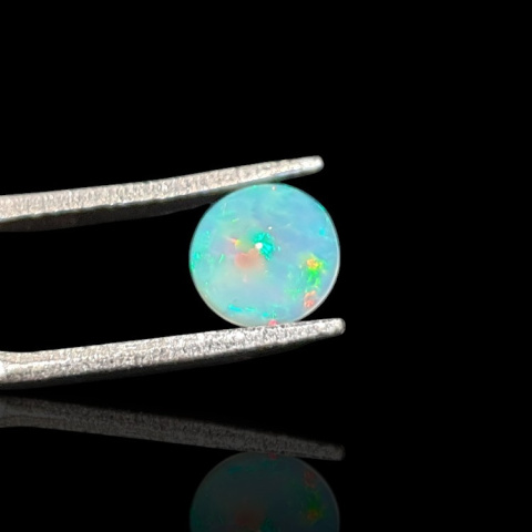 Opal from Ethiopia cabochon fi 7 mm no 801 Opal from Ethiopia cabochon fi 7 mm no 801