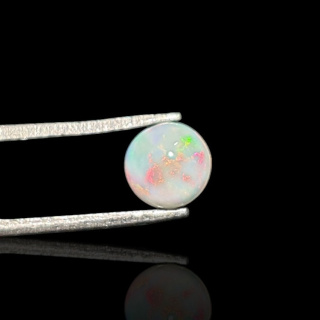 Opal from Ethiopia cabochon fi 7 mm no 803