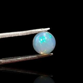 Opal from Ethiopia cabochon fi 7 mm no 804