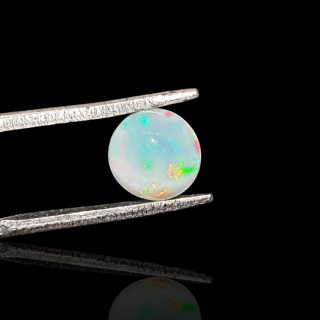 Opal from Ethiopia cabochon fi 7 mm no 805