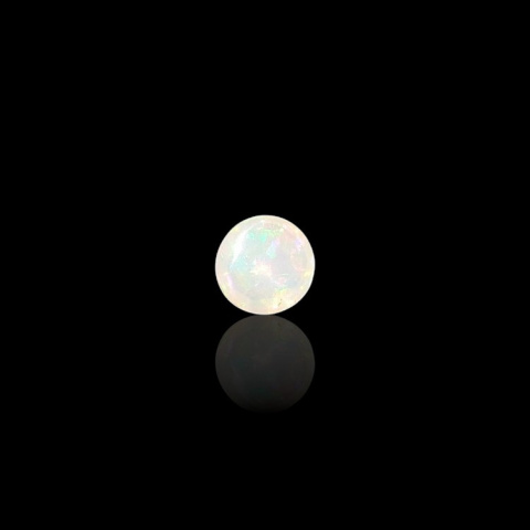 Opal from Ethiopia cabochon dia. 7 mm no 805 Opal from Ethiopia cabochon dia. 7 mm no 805