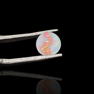 Opal from Ethiopia cabochon fi 7 mm no 806