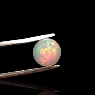 Opal from Ethiopia cabochon fi 7 mm no 806