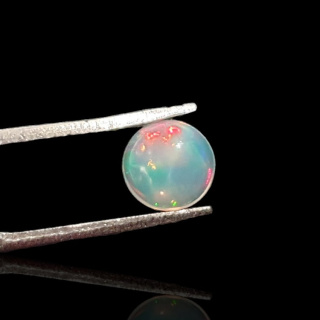 Opal from Ethiopia cabochon fi 7 mm no. 810