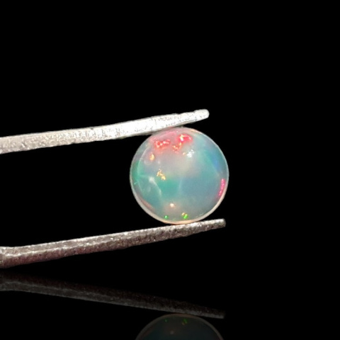 Opal from Ethiopia cabochon fi 7 mm no. 810 Opal from Ethiopia cabochon fi 7 mm no. 810