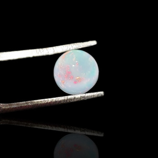 Opal from Ethiopia cabochon fi 7 mm no. 811