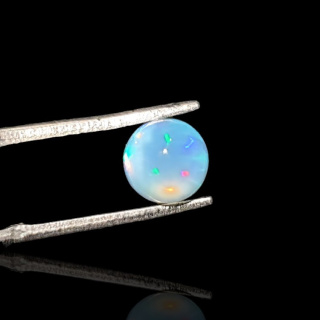 Opal from Ethiopia cabochon fi 7 mm no. 814