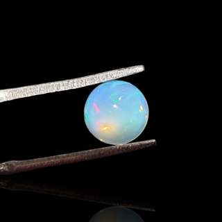 Opal from Ethiopia cabochon fi 7 mm no. 814
