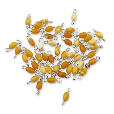Srebrny łącznik z mlecznym bursztynem bałtyckim 10x3 mm 4 szt. Srebrny łącznik z mlecznym bursztynem bałtyckim 10x3 mm 4 szt.
