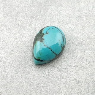Turkus tybetański kaboszon 10x7 mm nr 196
