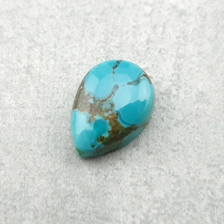 Turkus tybetański kaboszon 10x7 mm nr 200