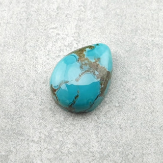 Turkus tybetański kaboszon 10x7 mm nr 200