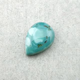 Turkus tybetański kaboszon 10x7 mm nr 202