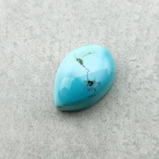 Turkus tybetański kaboszon 10x7 mm nr 203