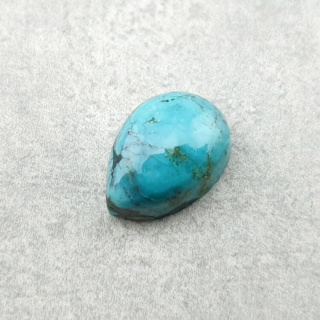 Turkus tybetański kaboszon 10x7 mm nr 204