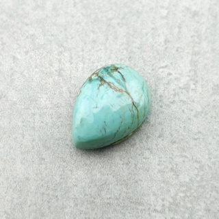 Turkus tybetański kaboszon 10x7 mm nr 205