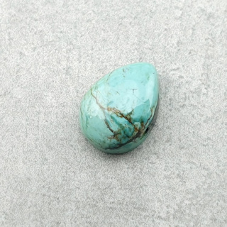 Turkus tybetański kaboszon 10x7 mm nr 205