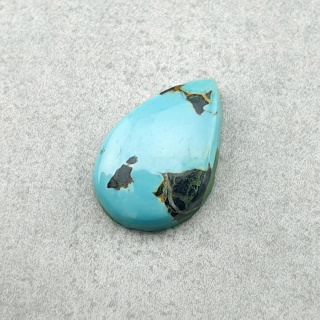 Turkus tybetański kaboszon 12x8 mm nr 210