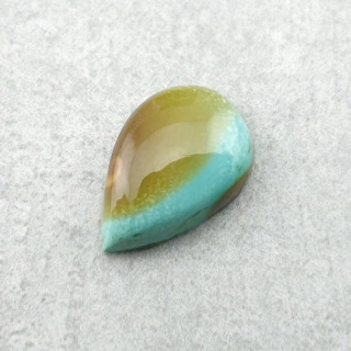 Turkus tybetański kaboszon 12x8 mm nr 211