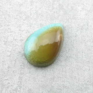 Turkus tybetański kaboszon 12x8 mm nr 211
