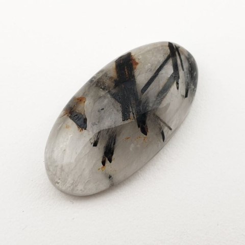 Kwarc z turmalinem kaboszon 31x16 mm nr 52 Kwarc z turmalinem kaboszon 31x16 mm nr 52