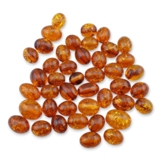 Bursztyn bałtycki koralik owal 11x8 mm 1 szt