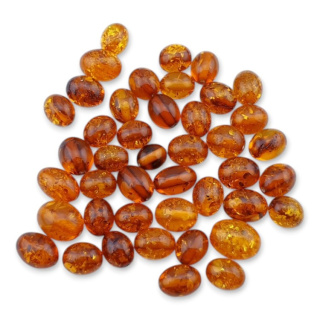 Bursztyn bałtycki koralik owal 11x8 mm 1 szt