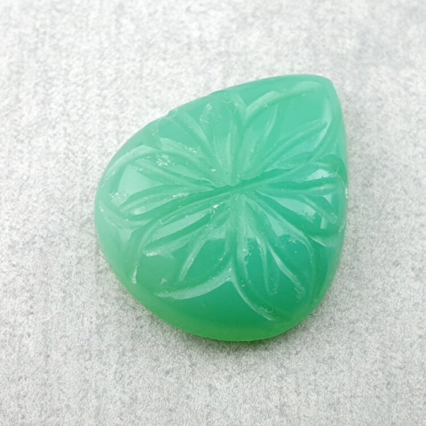Chalcedon chryzo kaboszon carving 21x18 mm nr 60 Chalcedon chryzo kaboszon carving 21x18 mm nr 60
