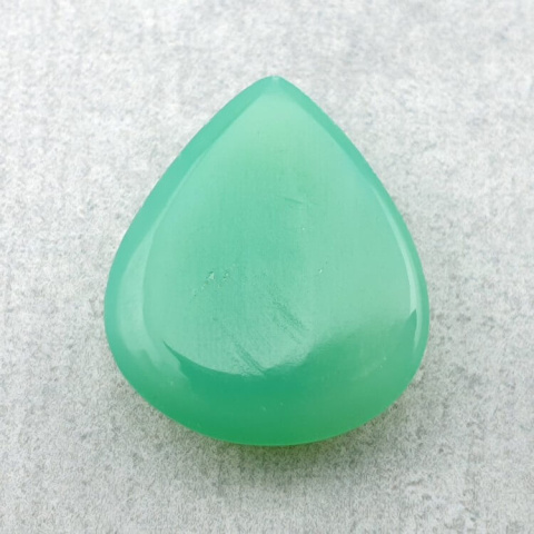 Chalcedon chryzo kaboszon carving 21x18 mm nr 60 Chalcedon chryzo kaboszon carving 21x18 mm nr 60