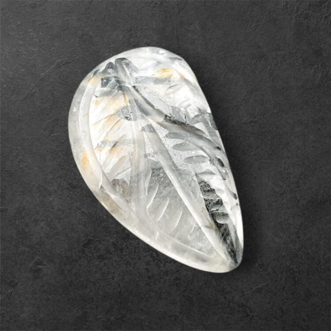 Quartz with tourmaline cabochon carving 25x15 mm no. 65 Quartz with tourmaline cabochon carving 25x15 mm no. 65