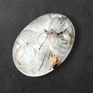 Quartz with tourmaline cabochon carving 26x18 mm no 49