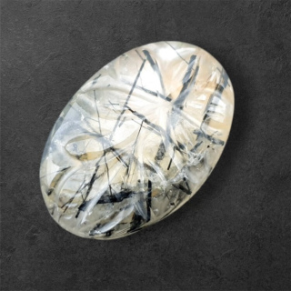 Quartz with tourmaline cabochon carving 26x18 mm no. 51