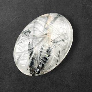 Quartz with tourmaline cabochon carving 27x19 mm no. 5
